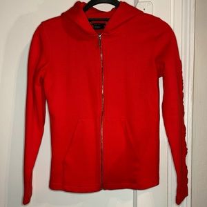 Armani Exchange zip up with details on the left sleeve. Sleek fit